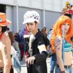 Costumi colorati e personaggi iconici al ROMICS di Roma, con cosplay di famosi anime e manga in un evento di successo dedicato al fumetto.