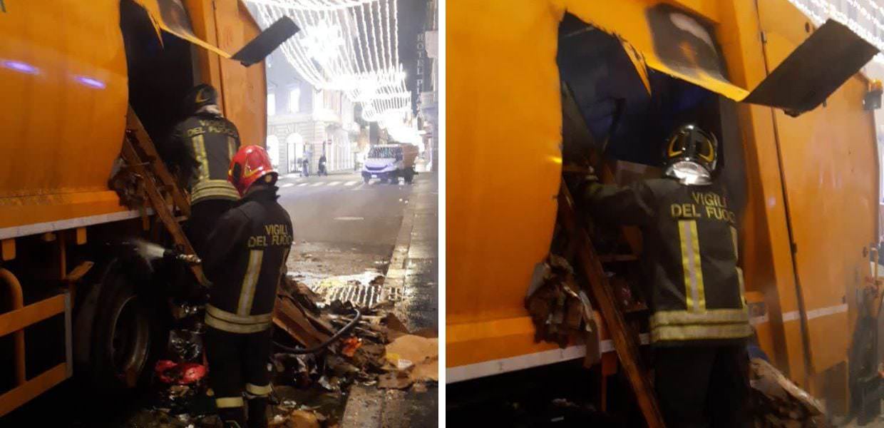 roma compattatore ama fuoco rifiuti